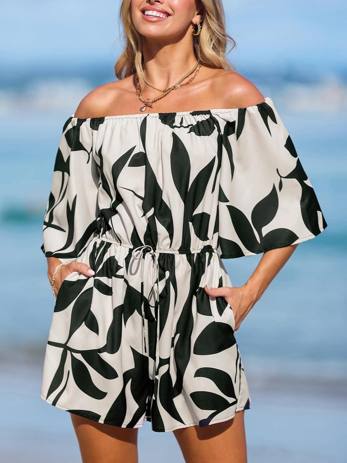 imageCUPSHE Womens Summer Casual 34 Sleeve Romper Wide Leg Floral Tropical Off Shoulder Elastic Waist Jumpsuit with PocketsBlack