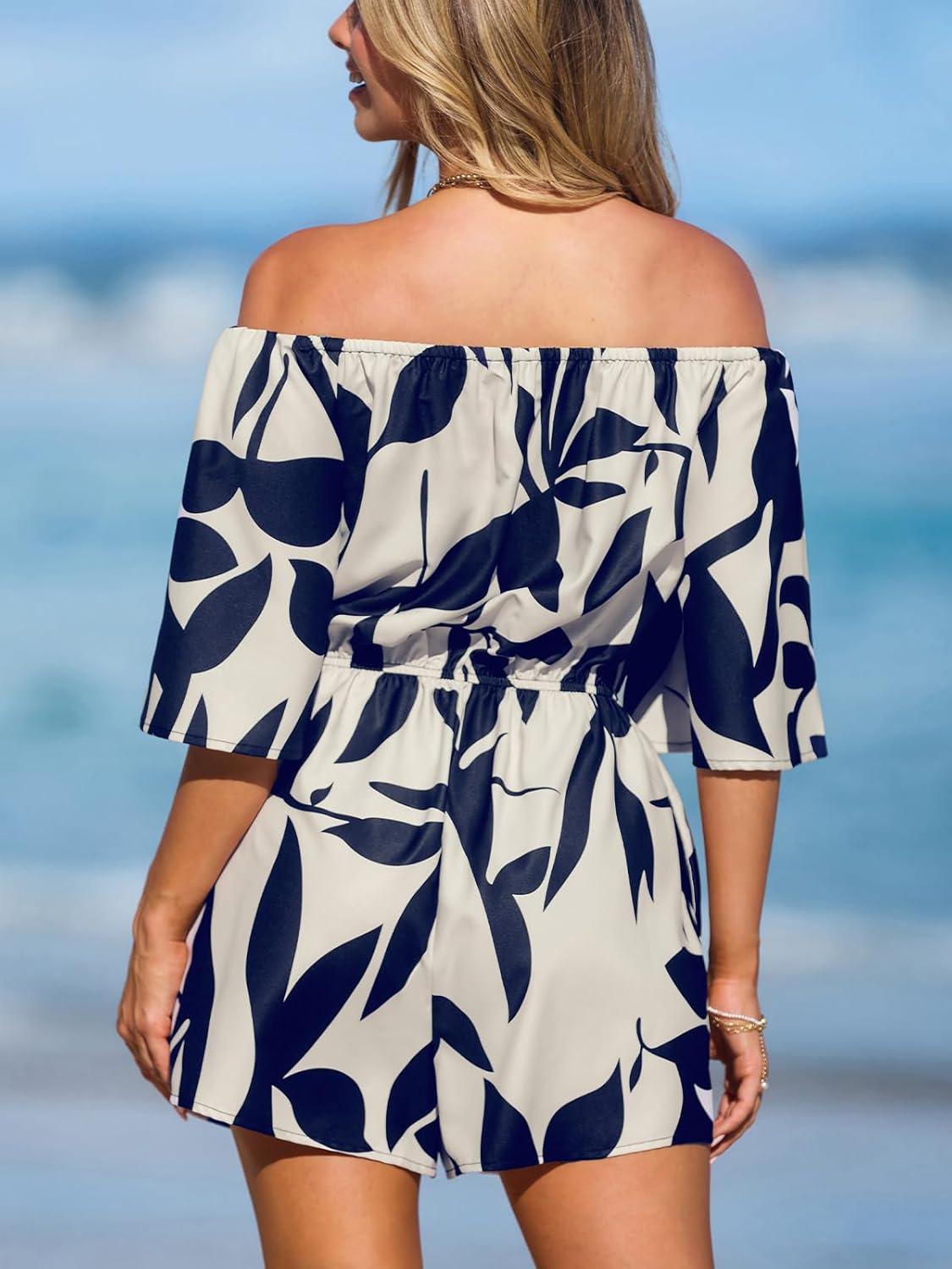 imageCUPSHE Womens Summer Casual 34 Sleeve Romper Wide Leg Floral Tropical Off Shoulder Elastic Waist Jumpsuit with PocketsNavy